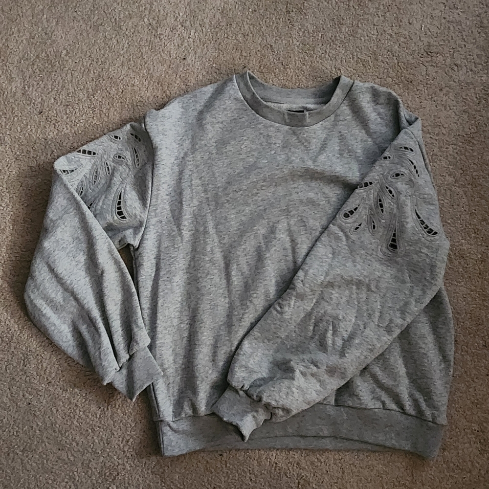 Brand new gap sweatshirt with detail on sleeve